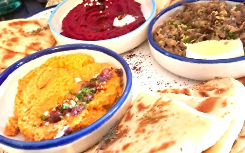 Three Nostos dips with pita bread