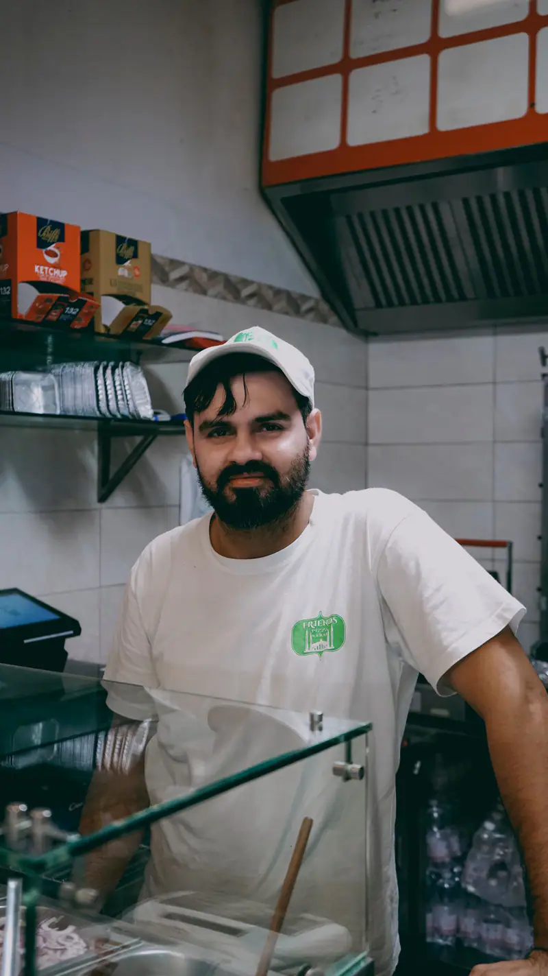 A young cook in a professional kitchen